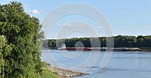 Barge delivering goods on the Mississippi River near St Louis Missouri
