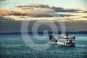 Barge or ferry on a cloudy evening