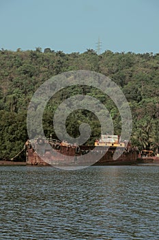 Barge halted at the bank of the river