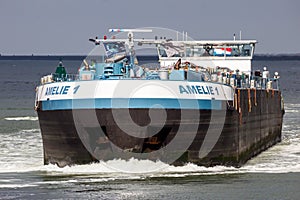 Barge on the Meuse river in the Port of Rotterdam. September 3, 2016
