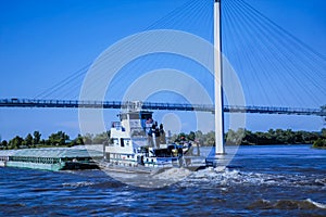 A barge moving northwards on River Missouri at Omaha