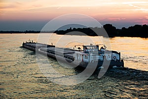 Barge at sunset