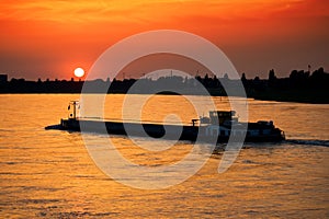 Barge at sunset