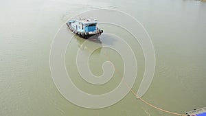 Barge and Tug Boat cargo ship in Choaphraya river at Ayutthaya Thailand