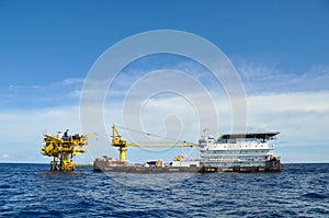 Barge and tug boat in open sea,Oil and gas platform in the gulf or the sea, The world energy, Offshore oil and rig construction