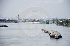 Barge and Tugboat cargo ship in Chao Phraya river