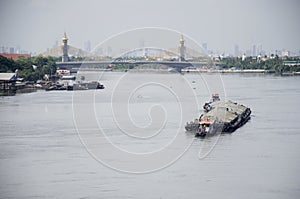 Barge and Tugboat cargo ship in Chao Phraya river