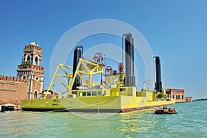 Barge vessel used for construction and maintenance MOSE barrer in Venice, Italy photo
