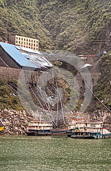 Barges at Coal loading installation in Xiling gorge on Yangtze River, China