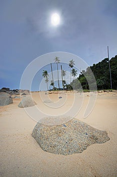 Bari Kecil Beach and the sun photo