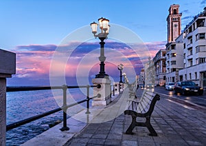 Bari seafront. Colorful amazing sunset. Coastline and city view.