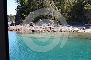 Bariloche, Argentina.Victoria Island view of the Anchorena Bay, Lake Nahuel Huapi from the side of a boat