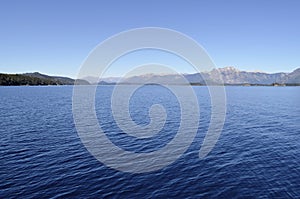 Bariloche, Argentina. View of Nahuel Huapi Lake from the side of a boat