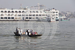 Barisal, Bangladesh, February 27 2017: Crowded water taxi transits in the port