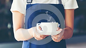 Barista asian young woman Cafe Making Coffee Preparation.