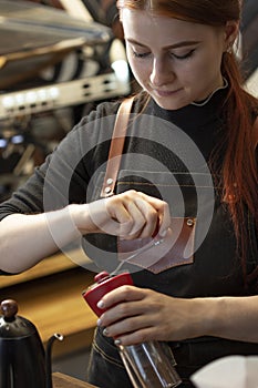 Barista barista grind coffee with a grinder make beverage Alternative pure over method
