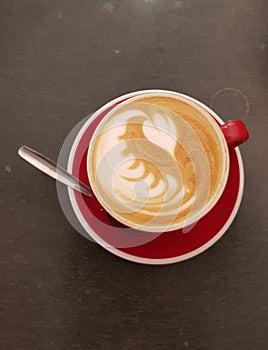 Barista coffee with froth design.