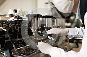 Barista make hot coffee, Worker making coffee by modern coffee machine