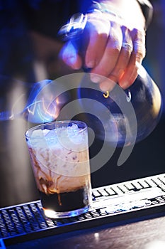 Barista making a chilled coffee beverage