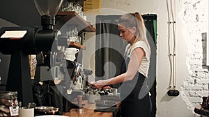 Barista making coffee with proffessional brewing coffee bar