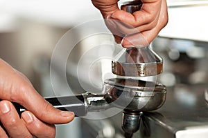 Barista prepares espresso