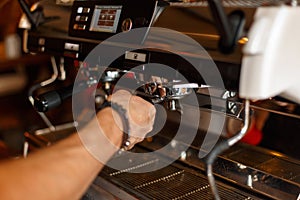 Barista preparing espresso, coffee making process