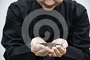 Barista is preparing rosted coffee bean ready