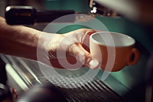 Barista prepraring to make fresh coffee