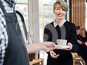 Barista serve cup client hipster girl coffee shop