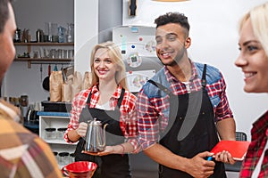 Barista serving clients give cup tea coffee shop bar counter