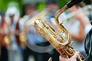 Baritone saxophone player performs street performances with his