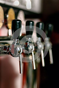 Barkeeper pulling a pint of beer