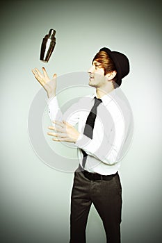 Barkeeper shaking cocktails