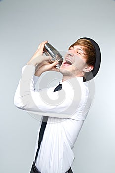 Barkeeper shaking cocktails