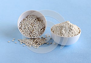 Barley flour and barley grains in bowls