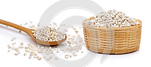 Barley Grains in the basket and wood spoon
