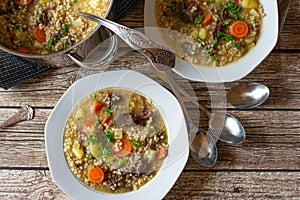 Barley soup with meat and root vegetables