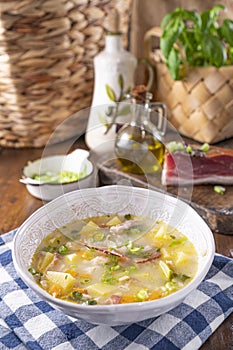 barley soup, zuppa di orzo. Zuppa tradizionale con pancetta e orzo nel nord italia, Trento. Cucina contadina, tipica photo