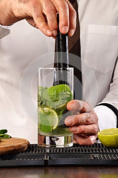 Barman preparing cocktail