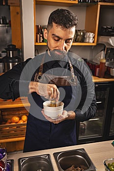 Barman preparing matcha latte