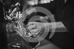 Barman at work in the pub