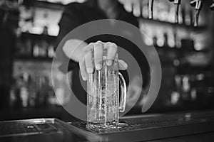 Barman at work in the pub