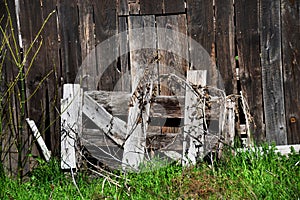 Barn Door Barricaded With Portion of Wooden Fence