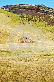 Barn on a hill in southern Iceland