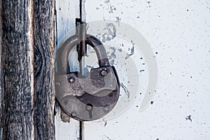 Barn old rusty lock on the door.