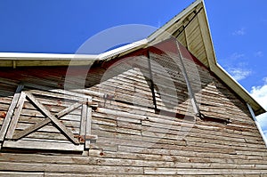 Barn overhang and hay loft doors photo