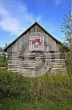 Barn quilt on an old building