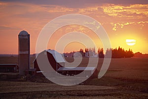 Barn and Silo at sunset,