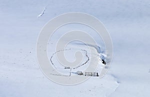 Barn in the snow, on the slopes of the mountain Shar