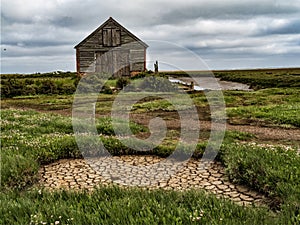 The Thornham river and Barn, Norfolk, UK